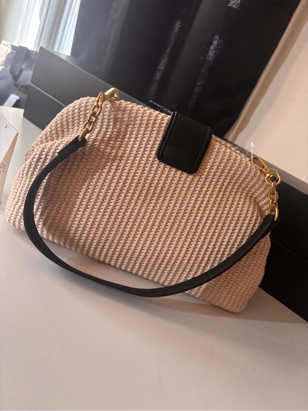 Cream Woven Shoulder Bag with Black Trim and Gold Chain